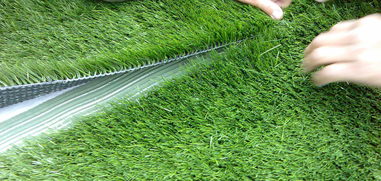 https://www.artificialgrasssomersetwest.co.za/wp-content/uploads/2020/07/Artificial_Grass_Installation.jpg